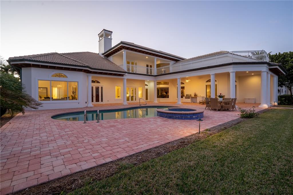 181 Ocean Beach Trail Vero Beach, FL 32963 - Photo 24 of 35 a house view with a garden space