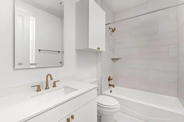 a bathroom with a sink and mirror