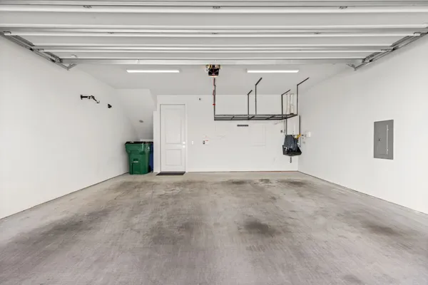 an aerial view of residential building with green space