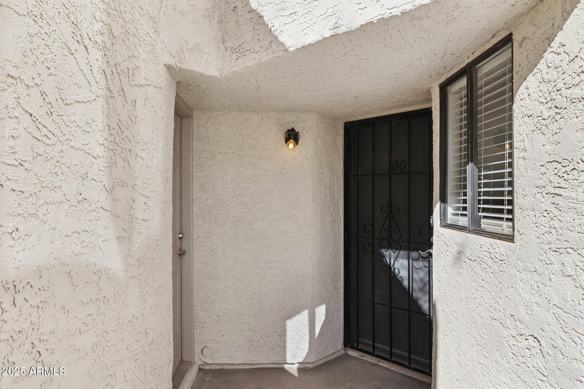 935 North Granite Reef Road, Unit 100 Scottsdale, AZ 85257 - Photo 3 of 35 a view of front door