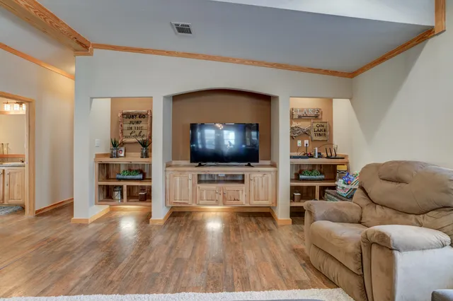 a kitchen with stainless steel appliances granite countertop a stove and a sink