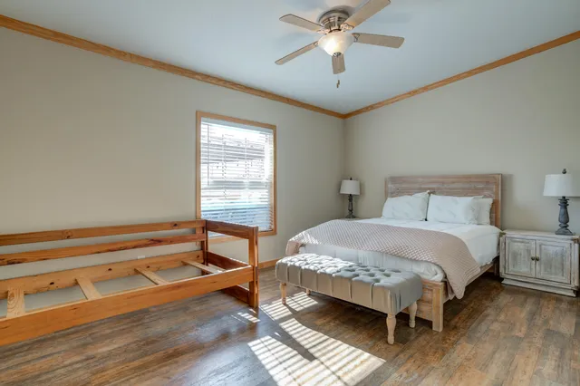 a view of a patio with wooden floor