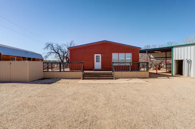 a view of a house with a snow
