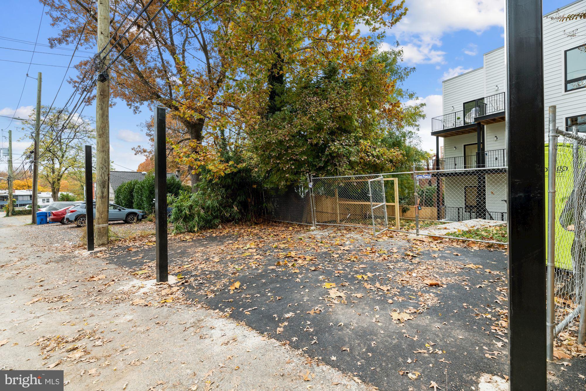 2642 39th Street Northwest, Unit 5 Washington, DC 20007 - Photo 25 of 26 Exterior Rear Surface Parking