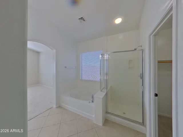 a bathroom with a sink double vanity and a mirror