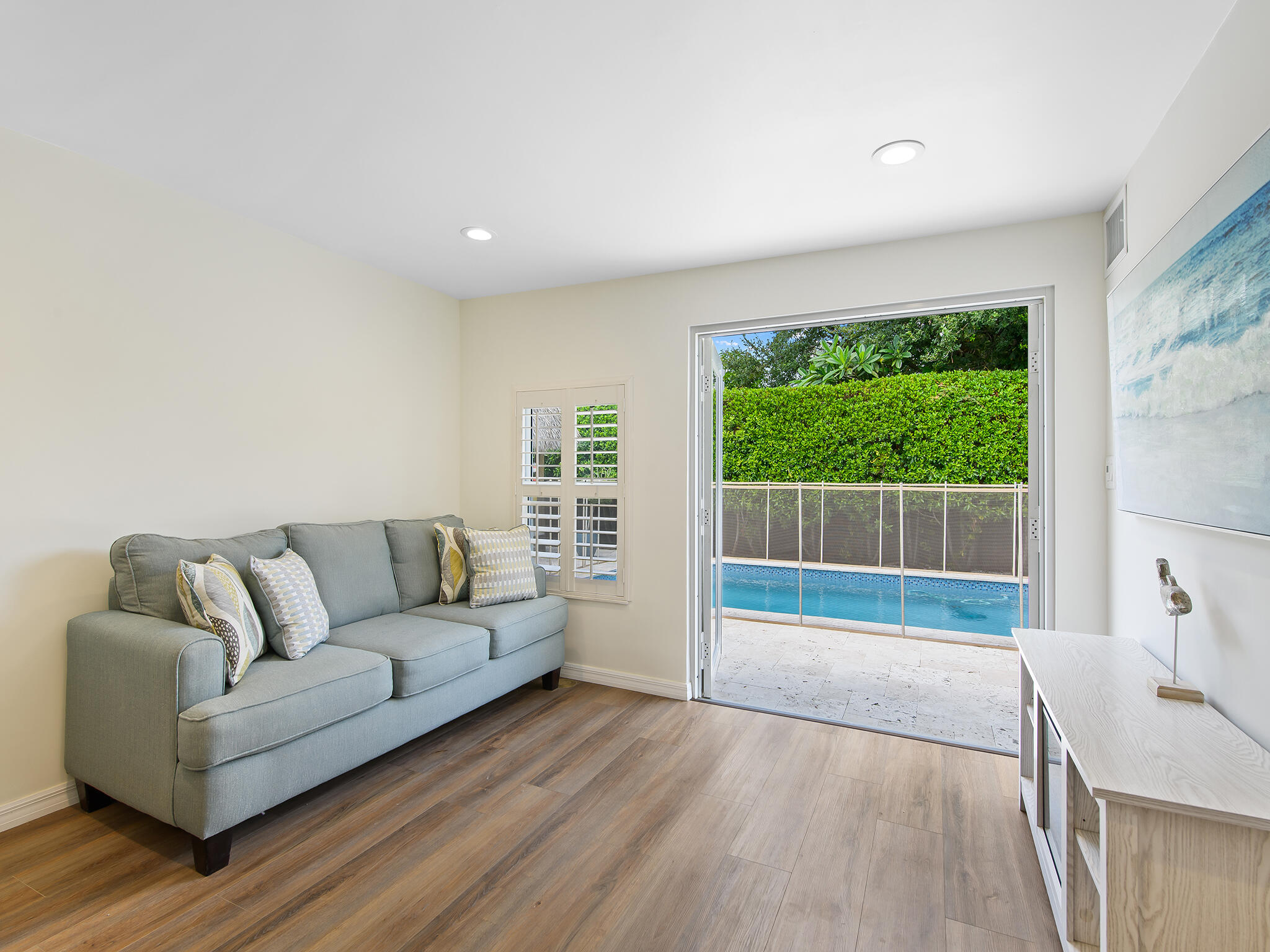 2401 Northeast 45th Street Lighthouse Point, FL 33064 - Photo 18 of 27 a living room with furniture and a large window