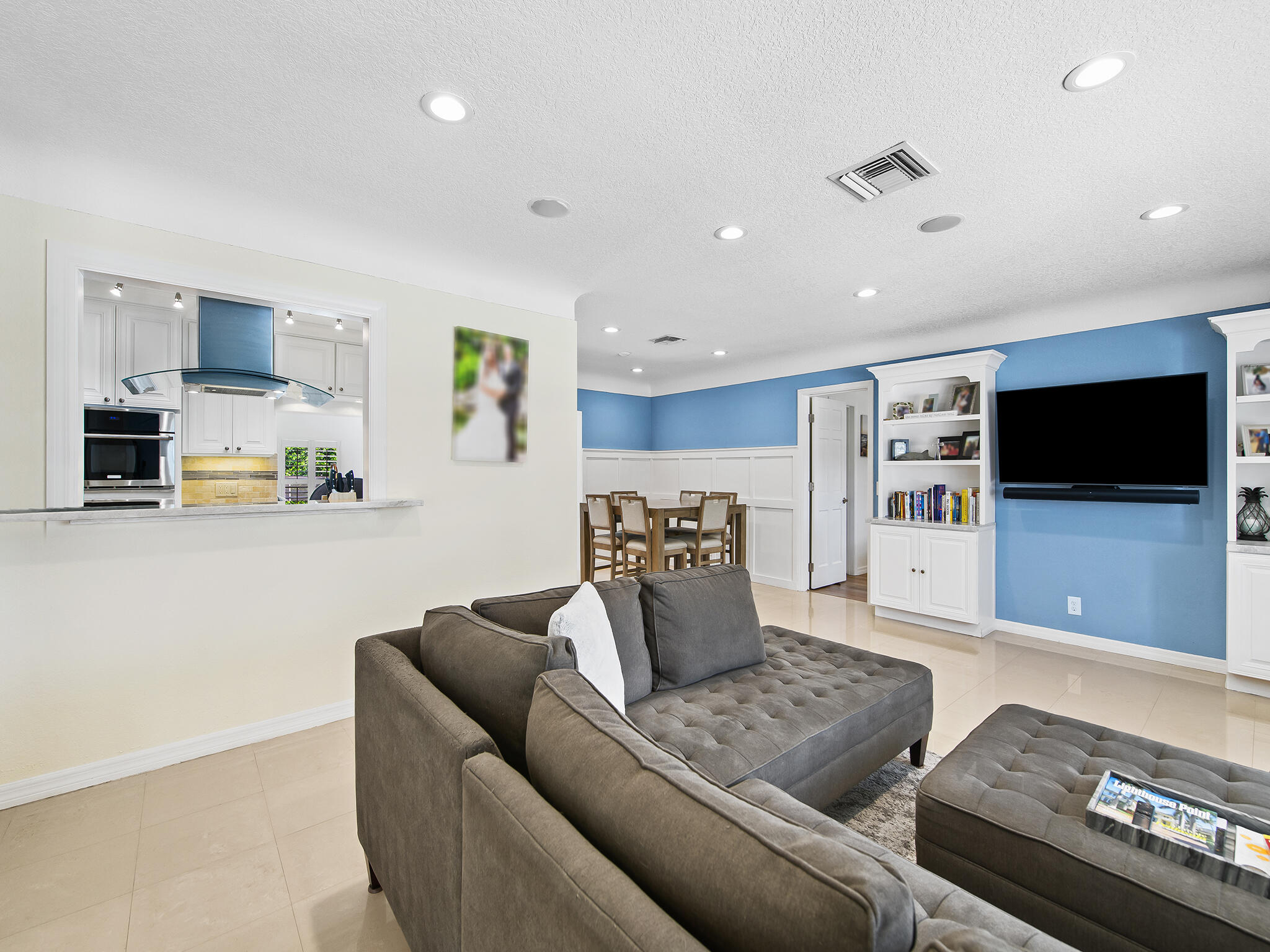 2401 Northeast 45th Street Lighthouse Point, FL 33064 - Photo 9 of 27 a living room with furniture and a flat screen tv