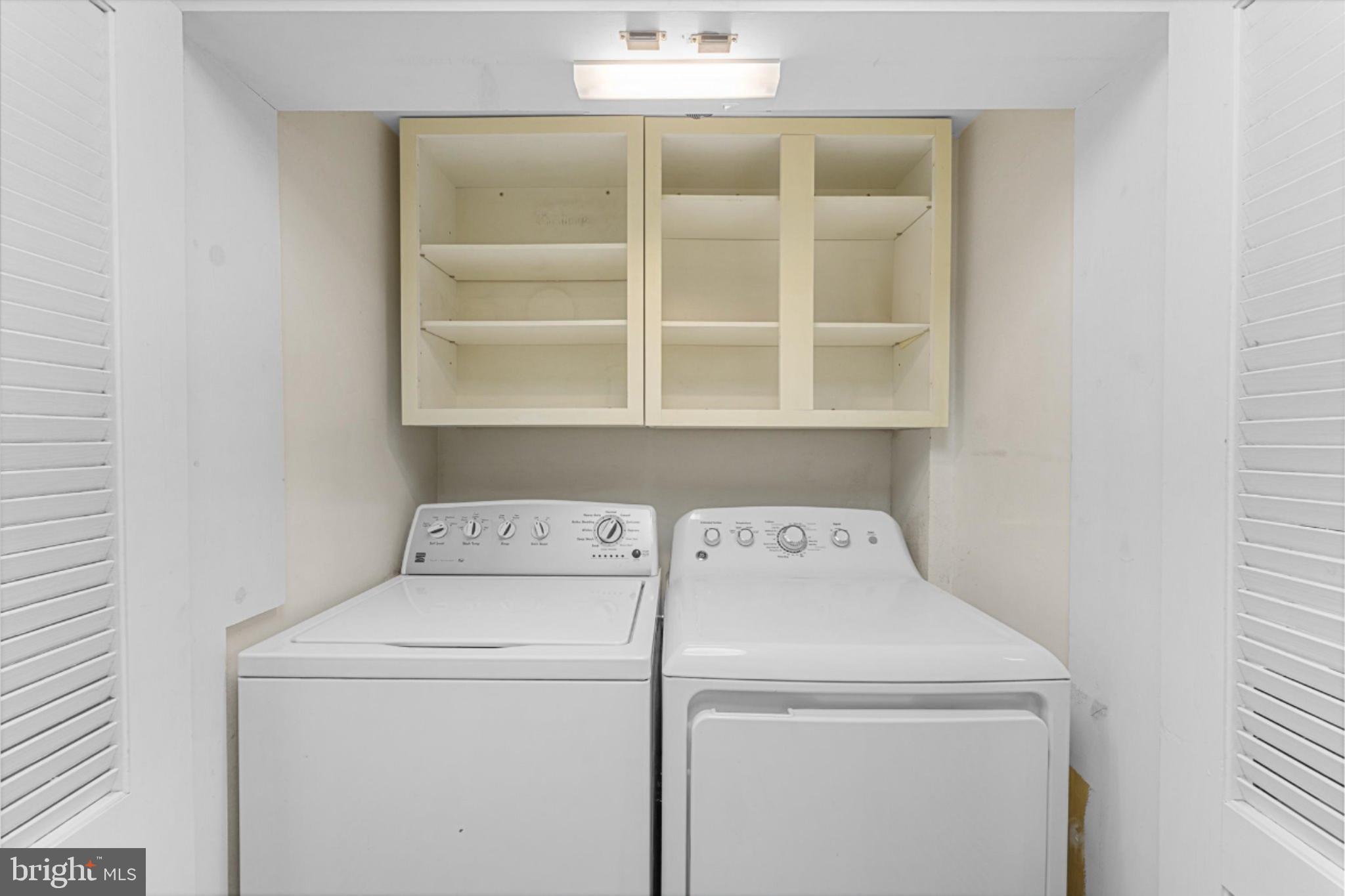 6101 Edsall Road, Unit 1402 Alexandria, VA 22304 - Photo 11 of 37 a utility room with dryer and washer