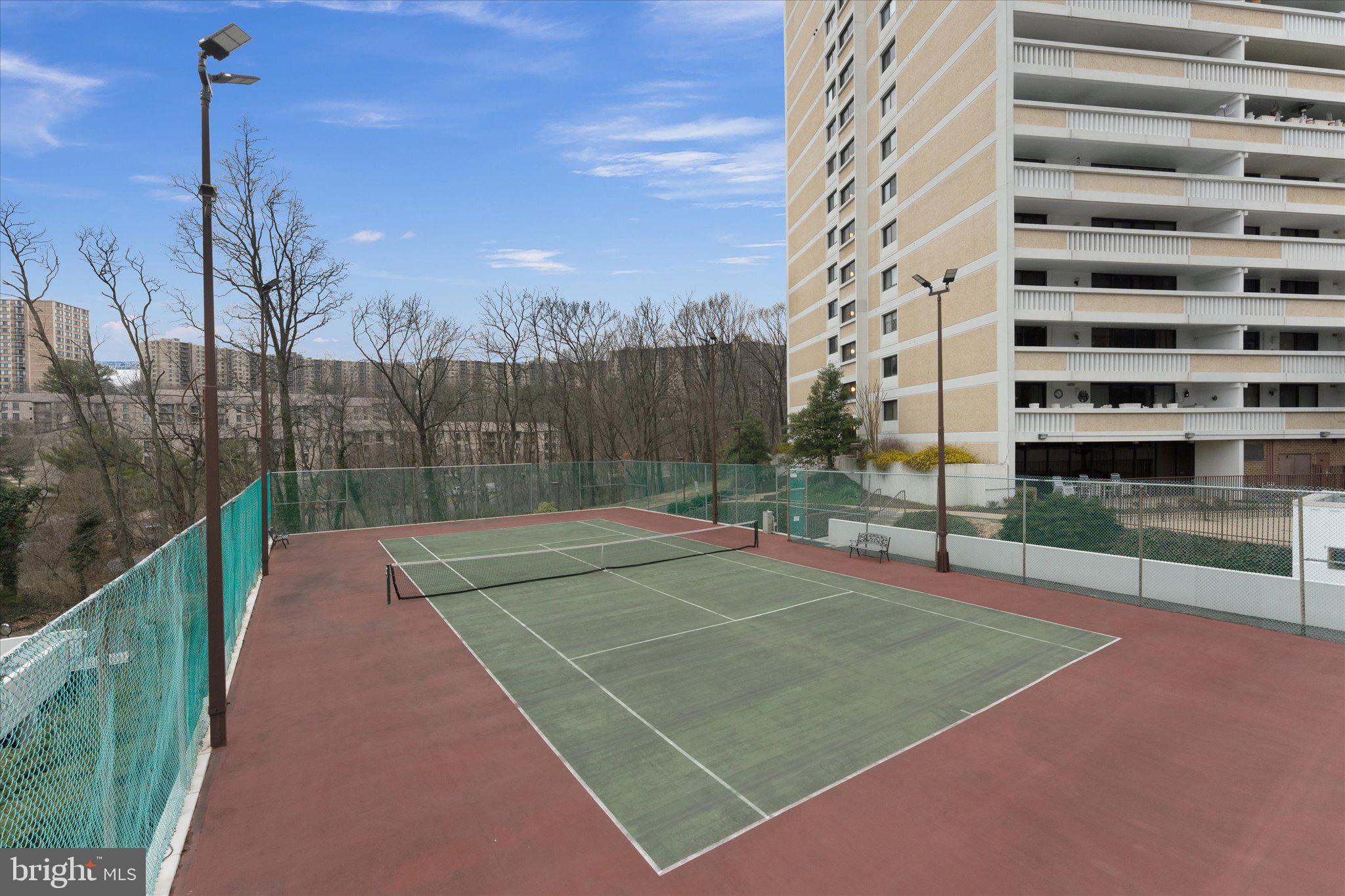 6101 Edsall Road, Unit 1402 Alexandria, VA 22304 - Photo 35 of 37 a view of a tennis court