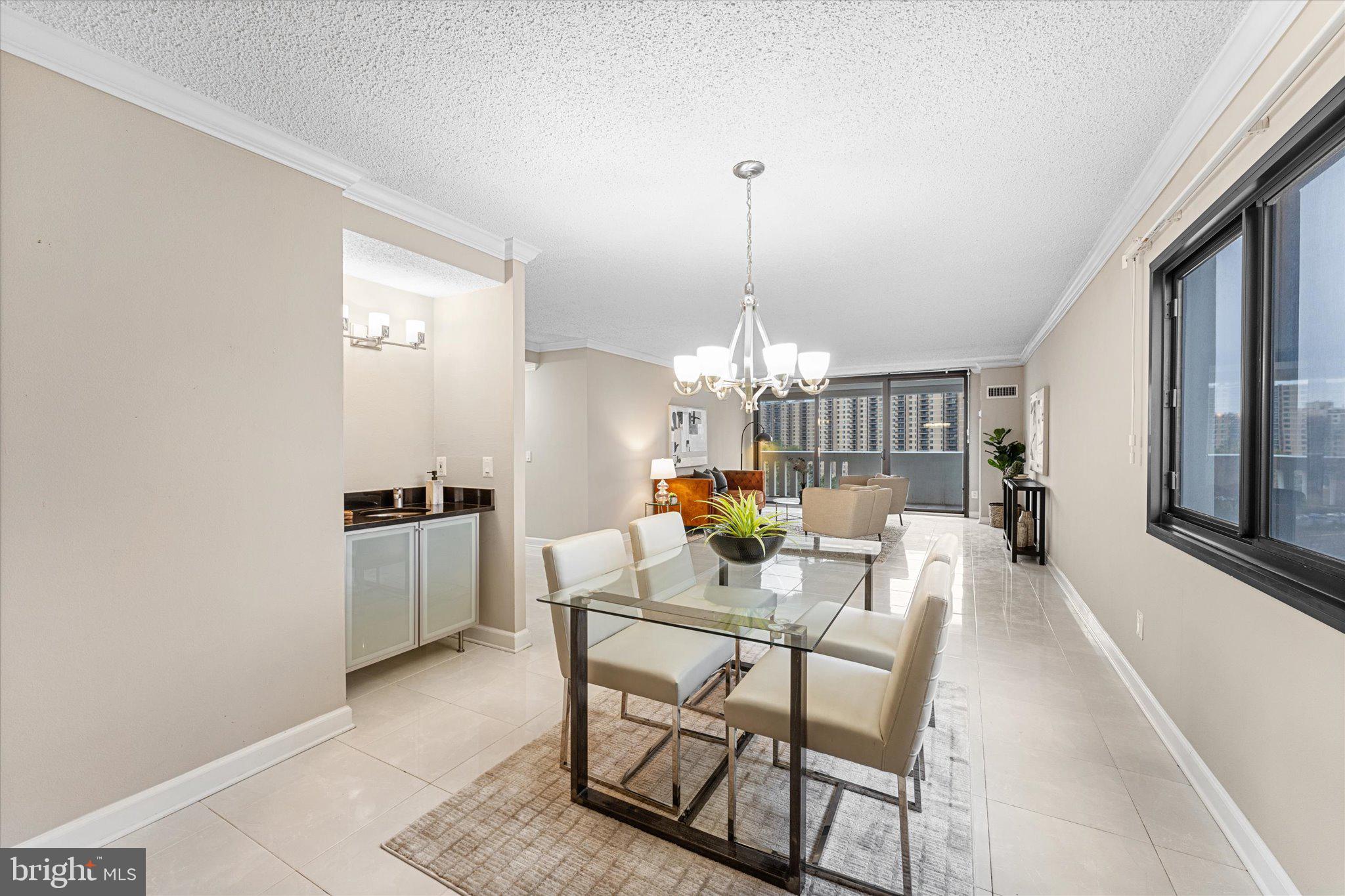6101 Edsall Road, Unit 1402 Alexandria, VA 22304 - Photo 7 of 37 a view of a dining room with furniture