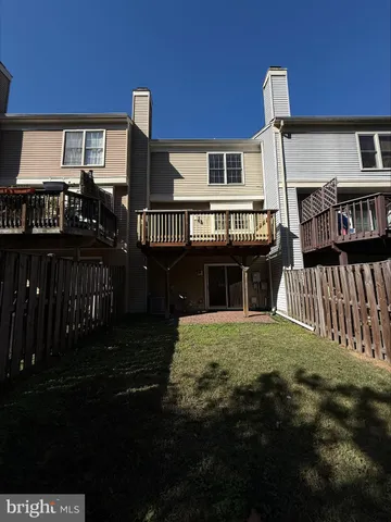 a front view of a house with yard