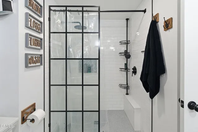 a view of a patio with a table chairs and a backyard