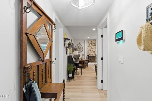 a view of a livingroom with furniture and entryway