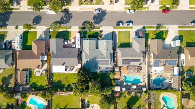 a view of a city with mountains in the background