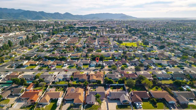 an aerial view of residential house with outdoor space
