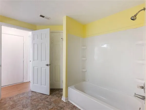 a bathroom with a bathtub