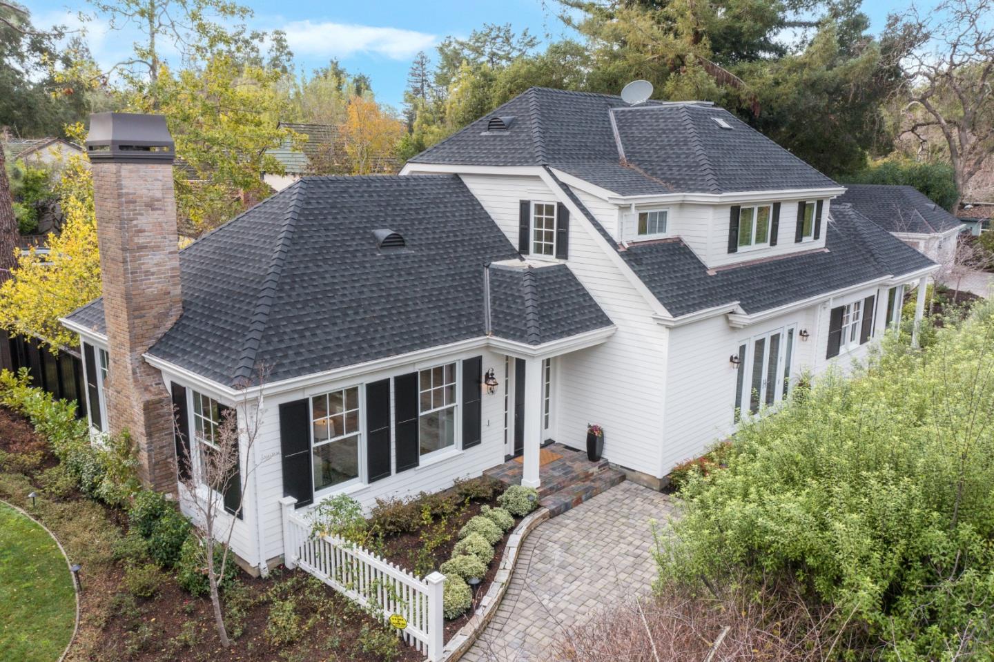 65 Maple Avenue Atherton, CA 94027 - Photo 1 of 45 a aerial view of a house next to a big yard and large trees