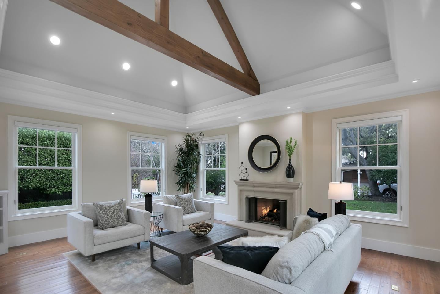 65 Maple Avenue Atherton, CA 94027 - Photo 12 of 45 a living room with furniture a fireplace and a large window