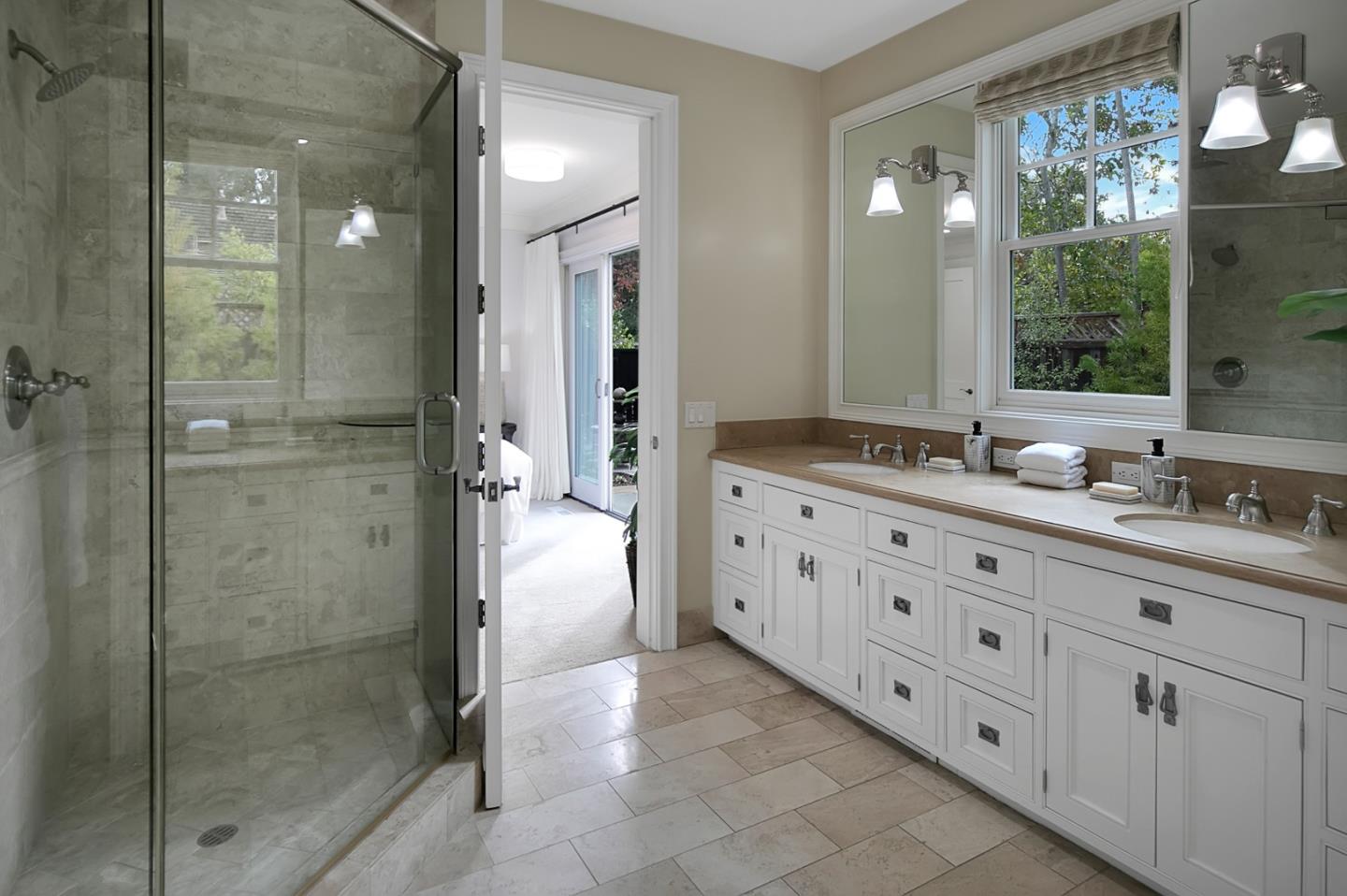 65 Maple Avenue Atherton, CA 94027 - Photo 27 of 45 a bathroom with a granite countertop sink mirror and shower