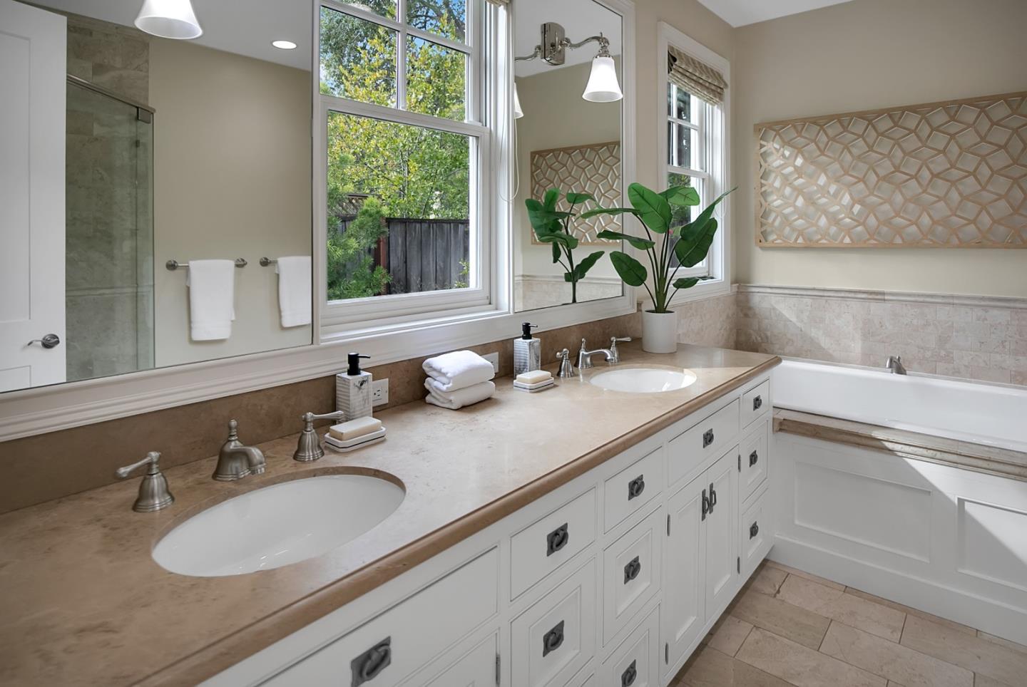 65 Maple Avenue Atherton, CA 94027 - Photo 28 of 45 a bathroom with a granite countertop sink and a mirror