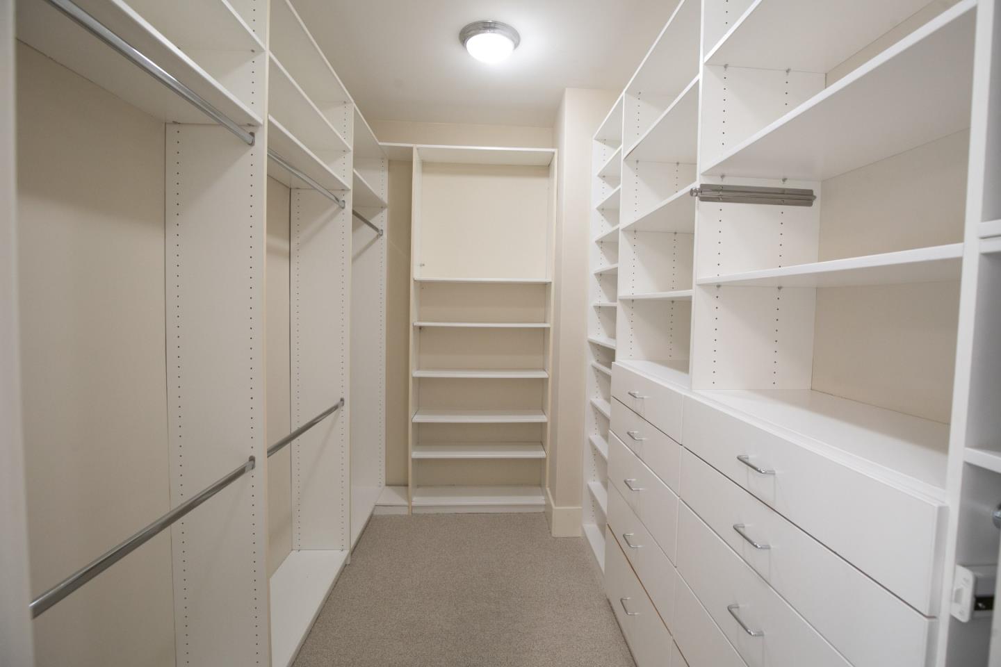 65 Maple Avenue Atherton, CA 94027 - Photo 29 of 45 a view of walk in closet with empty racks