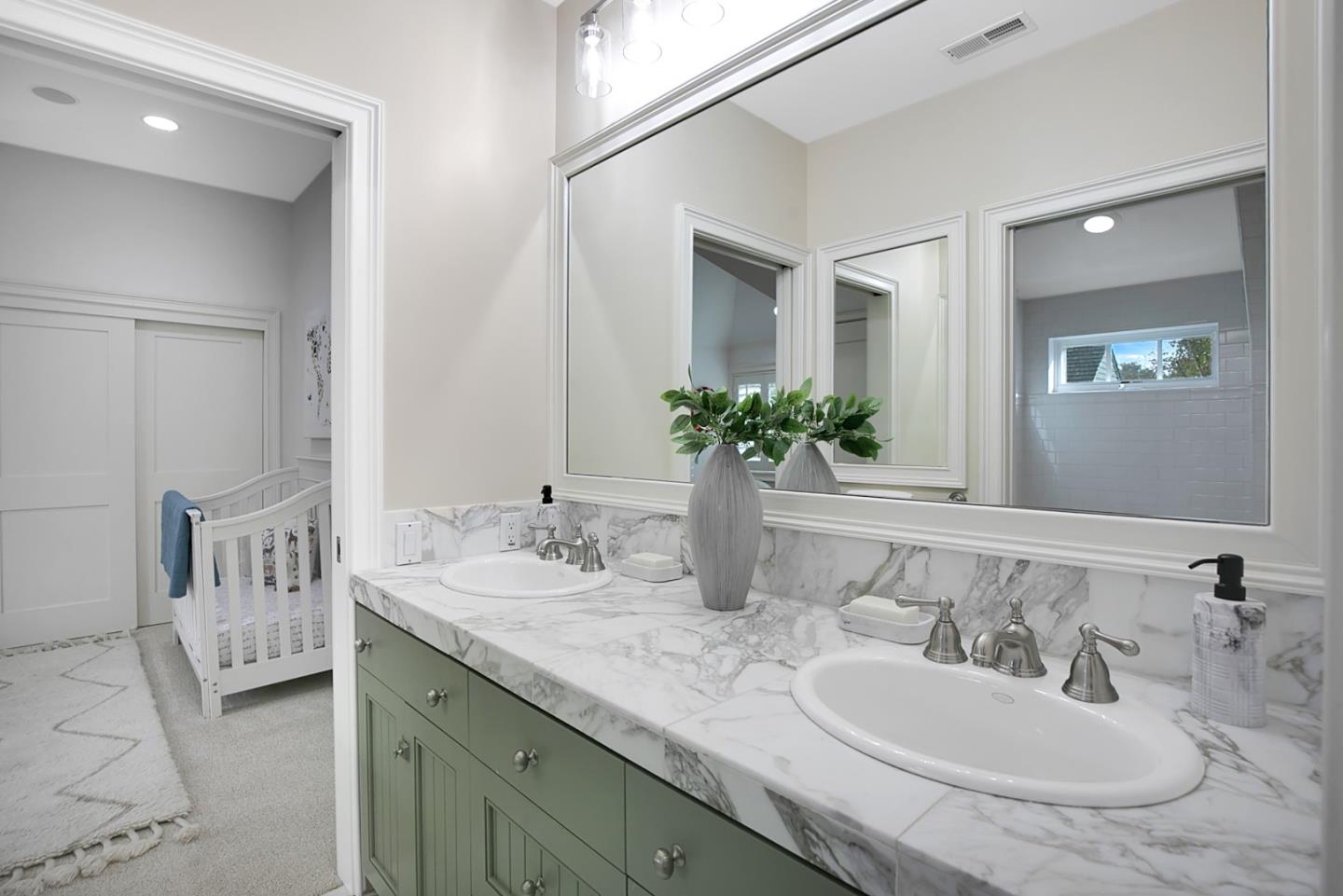 65 Maple Avenue Atherton, CA 94027 - Photo 32 of 45 a bathroom with a granite countertop sink and a mirror