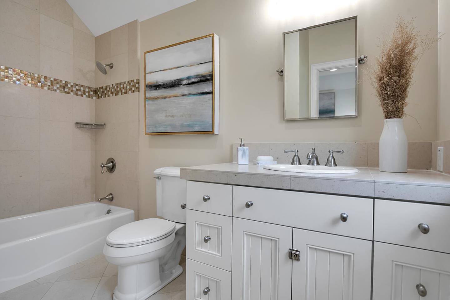 65 Maple Avenue Atherton, CA 94027 - Photo 36 of 45 a bathroom with a granite countertop toilet sink and mirror