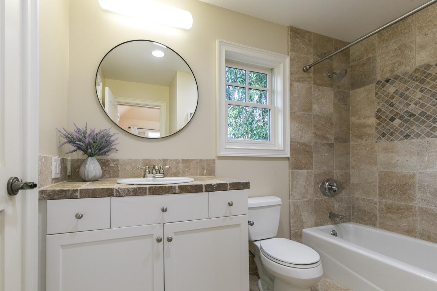 65 Maple Avenue Atherton, CA 94027 - Photo 40 of 45 a bathroom with a sink a toilet and a mirror