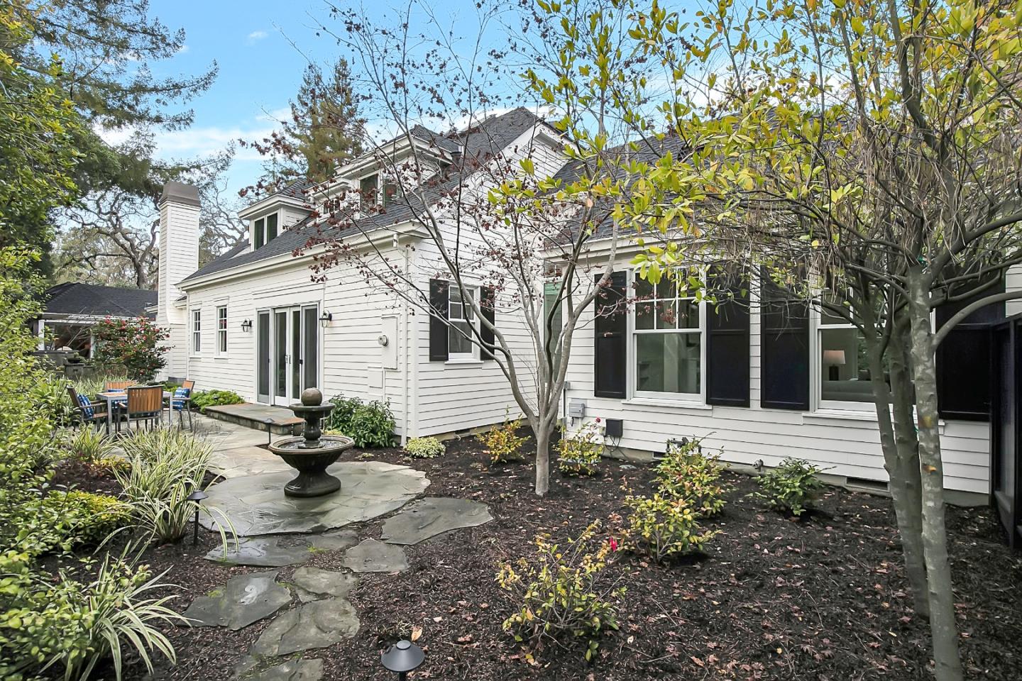 65 Maple Avenue Atherton, CA 94027 - Photo 5 of 45 a view of a house with backyard and sitting area