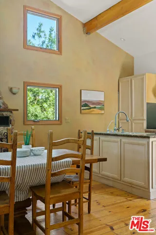 a view of street along with trees