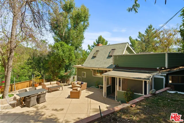a view of deck with wooden floor and outdoor seating