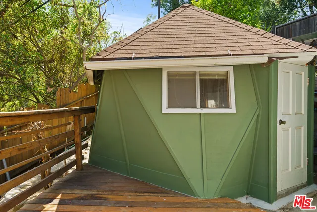 a view of a back yard with a patio