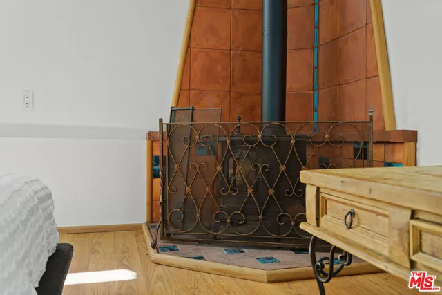 a kitchen with a sink a stove and cabinets