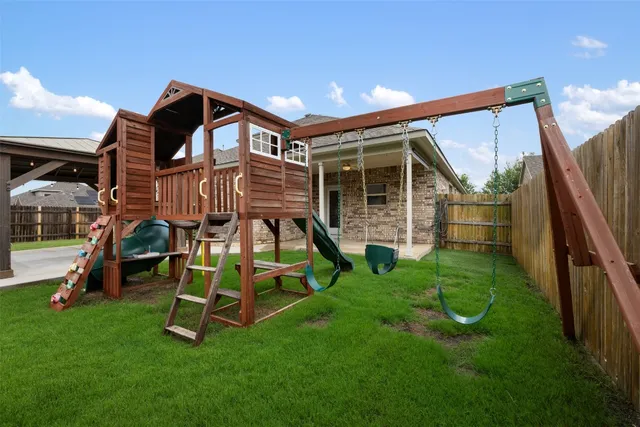 an aerial view of residential building with parking space