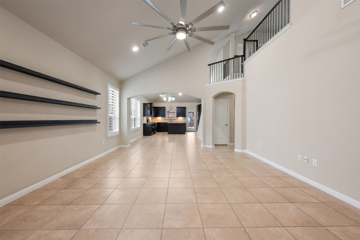 533 Flag Lane Leander, TX 78641 - Photo 6 of 40 Plantation shutters and floating shelves.