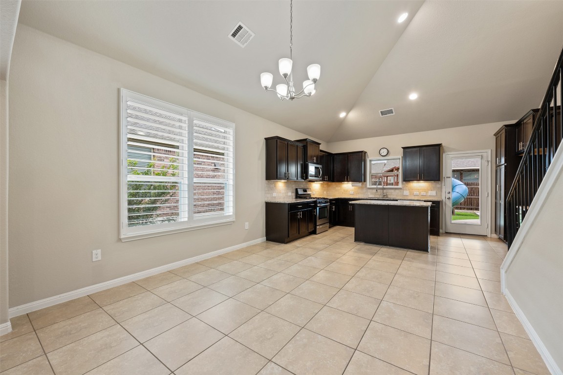 533 Flag Lane Leander, TX 78641 - Photo 9 of 40 Dining area open to kitchen and living
