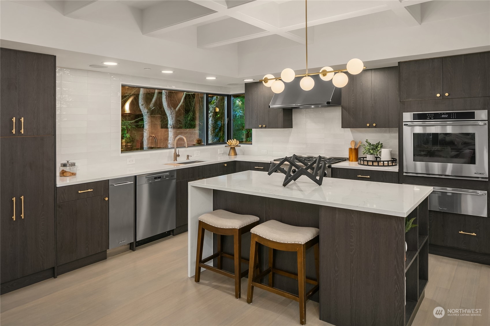 3240 Evergreen Point Road Medina, WA 98039 - Photo 14 of 40 a kitchen with a table and chairs in it