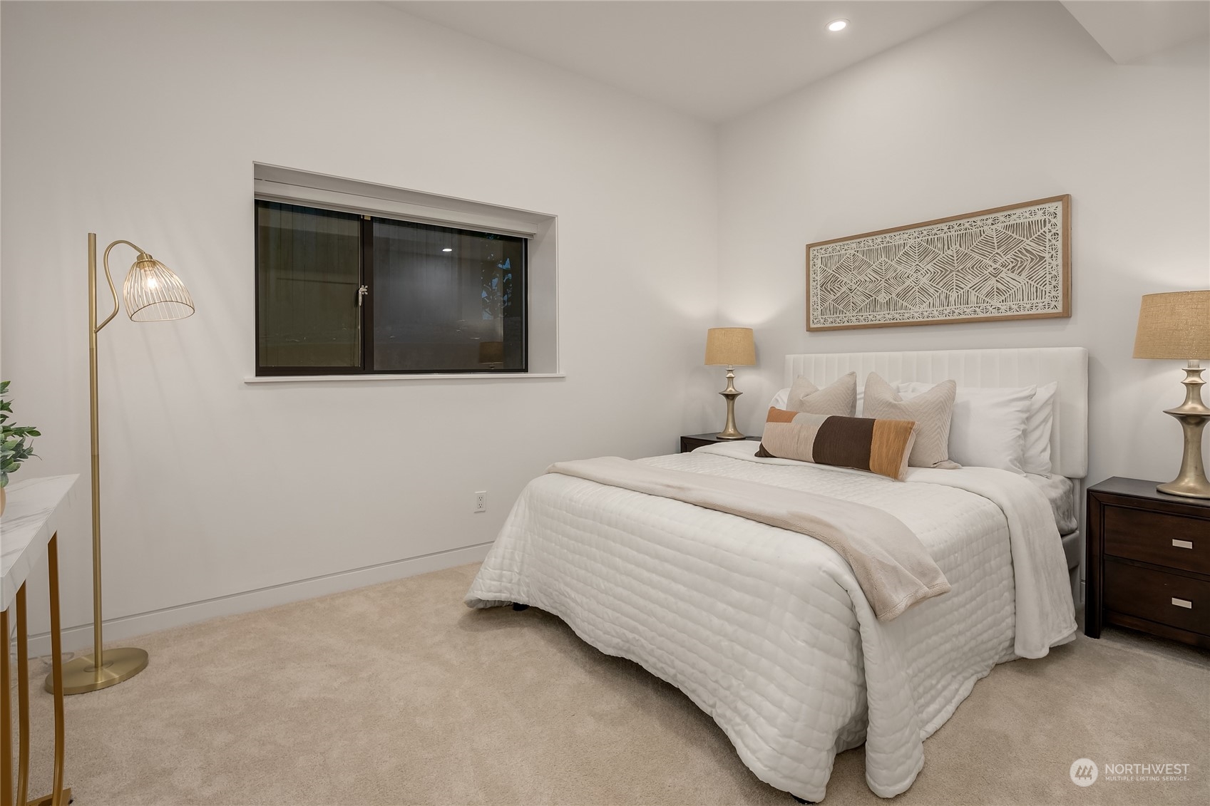 3240 Evergreen Point Road Medina, WA 98039 - Photo 28 of 40 a bedroom with a bed and a painting on the wall
