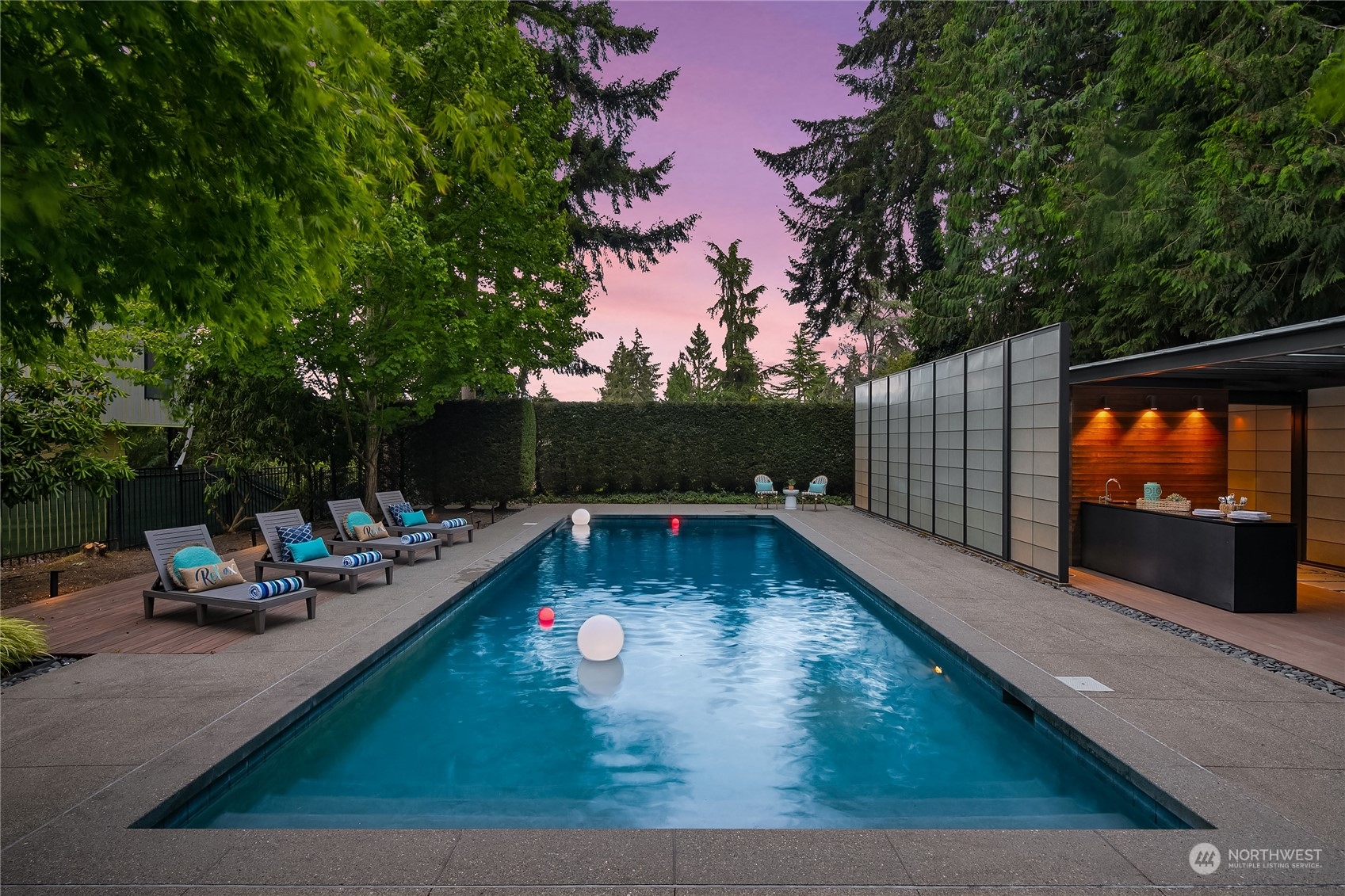 3240 Evergreen Point Road Medina, WA 98039 - Photo 32 of 40 a view of a swimming pool with a patio