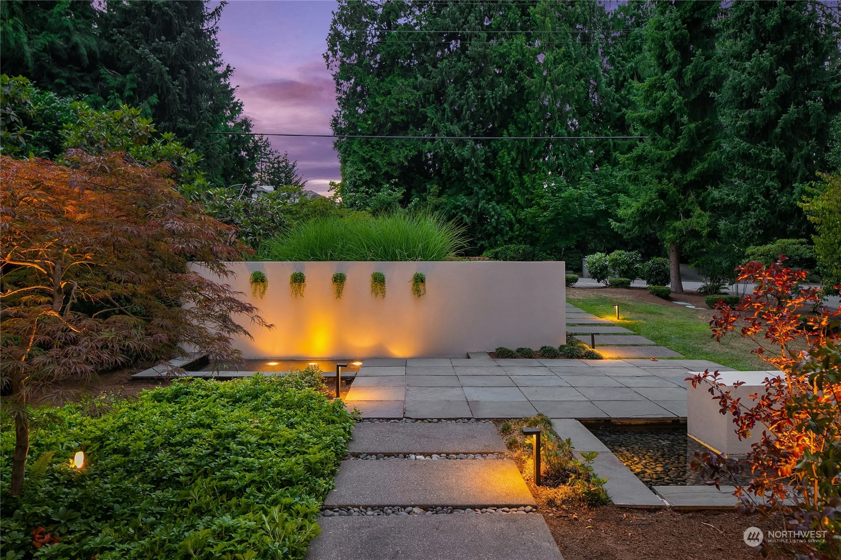 3240 Evergreen Point Road Medina, WA 98039 - Photo 5 of 40 an aerial view of a house with a garden