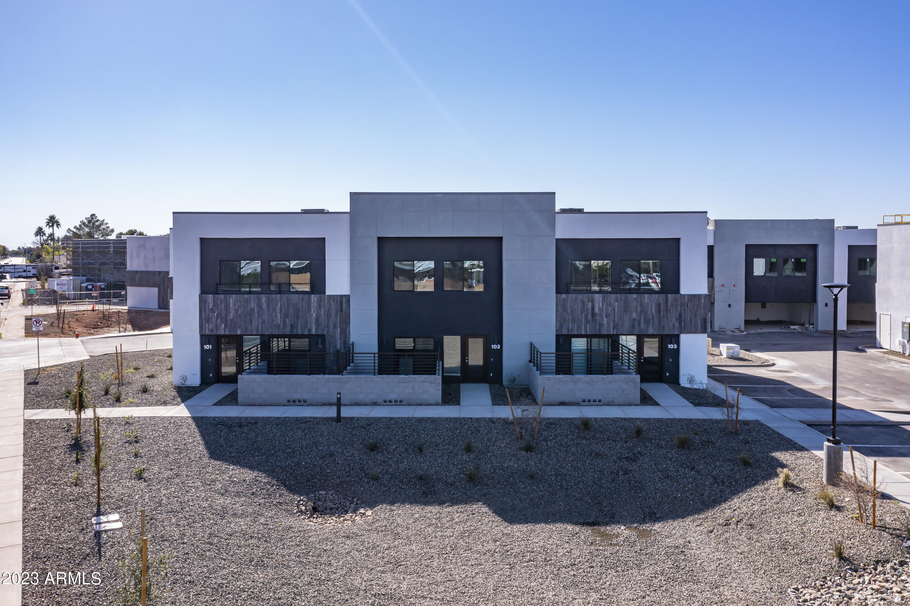 432 South 32nd Street, Unit 114 Mesa, AZ 85204 - Photo 4 of 75 a living room with furniture and wooden floor