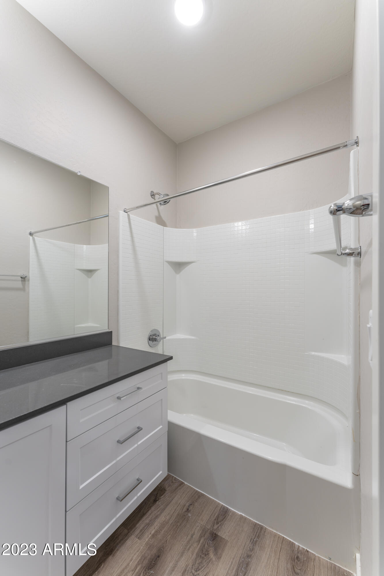 432 South 32nd Street, Unit 114 Mesa, AZ 85204 - Photo 42 of 75 a bathroom with a bathtub and a sink