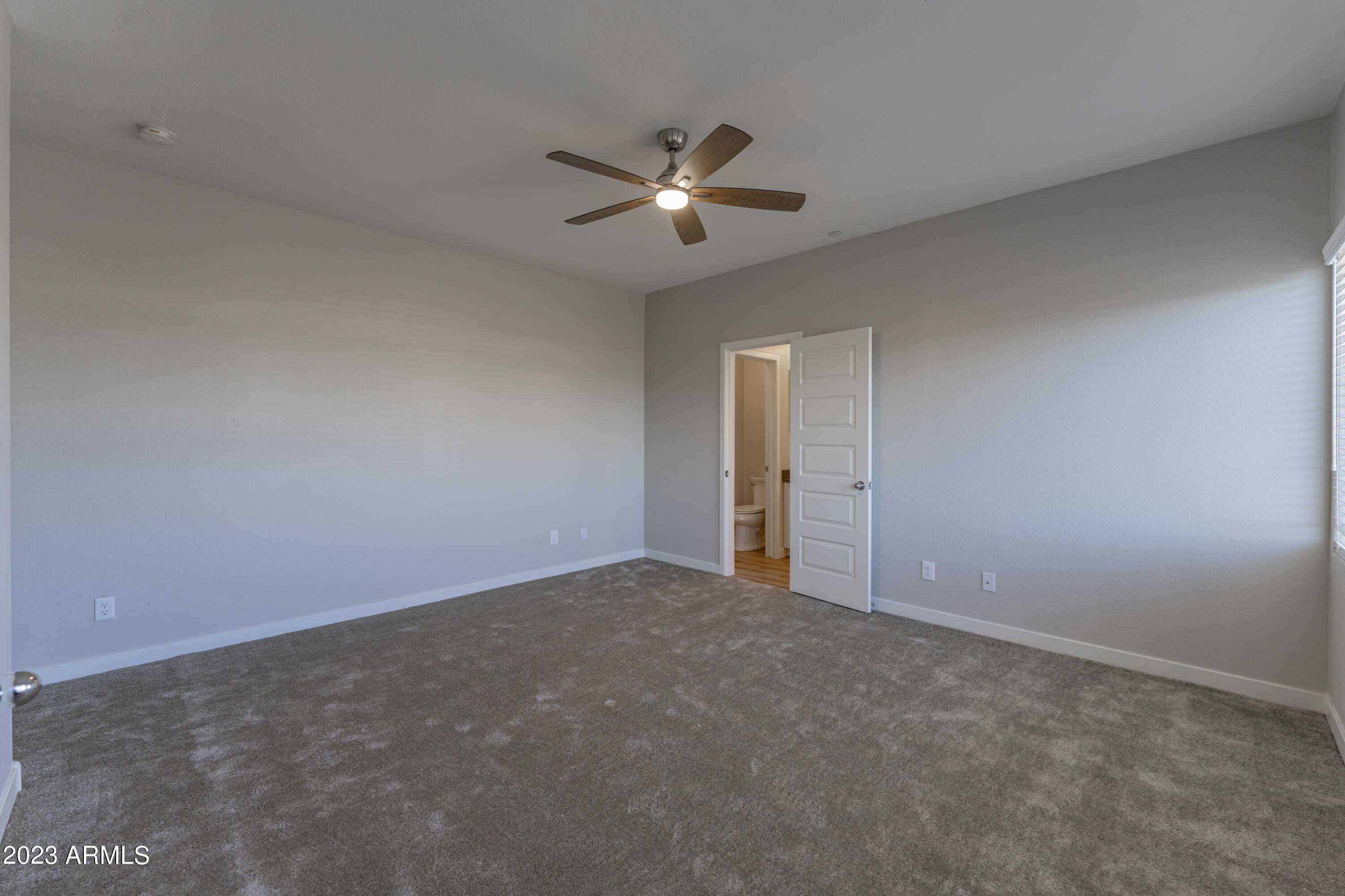432 South 32nd Street, Unit 114 Mesa, AZ 85204 - Photo 52 of 75 an empty room with closet and windows