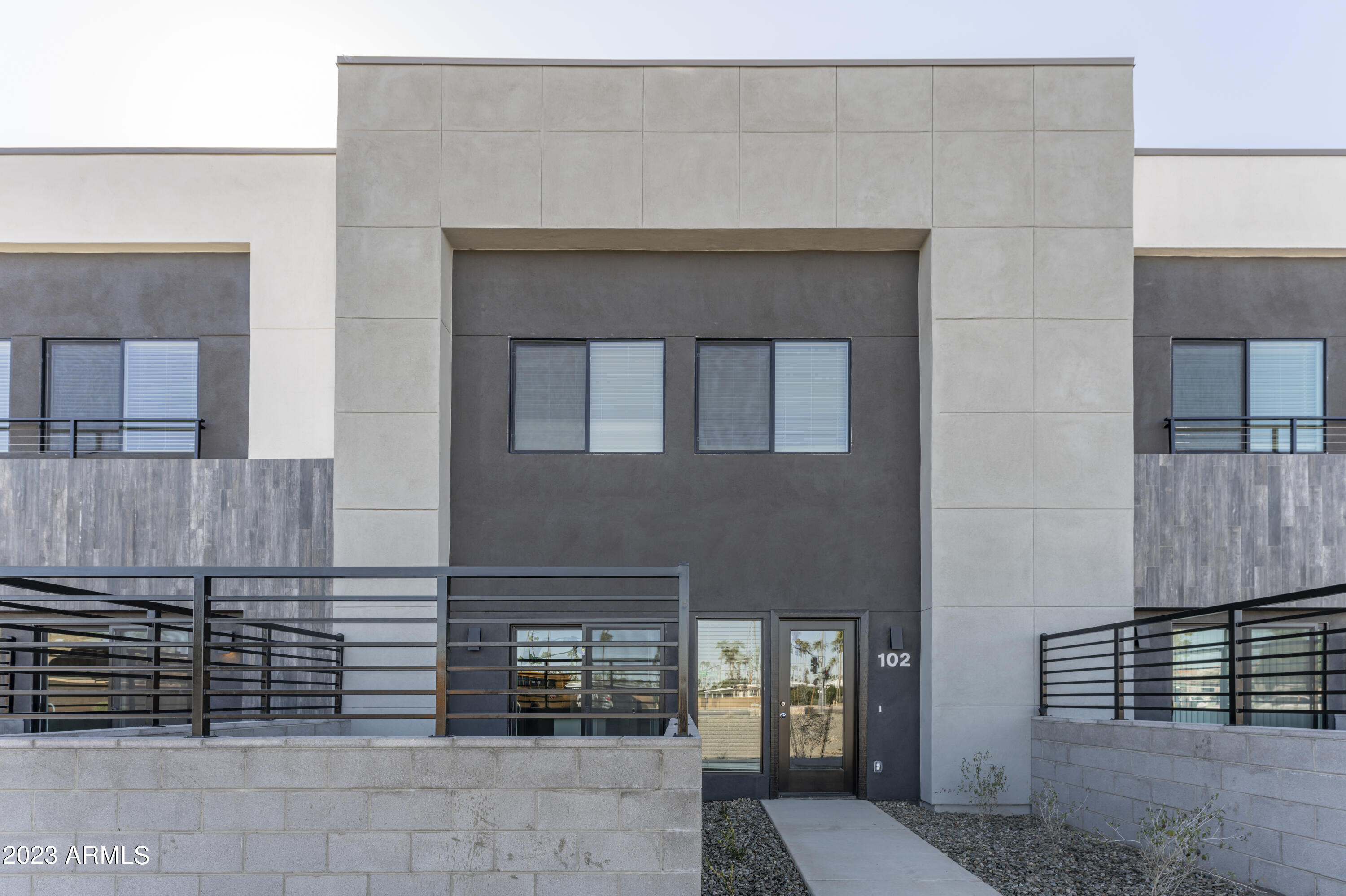 432 South 32nd Street, Unit 114 Mesa, AZ 85204 - Photo 64 of 75 a front view of a house with parking