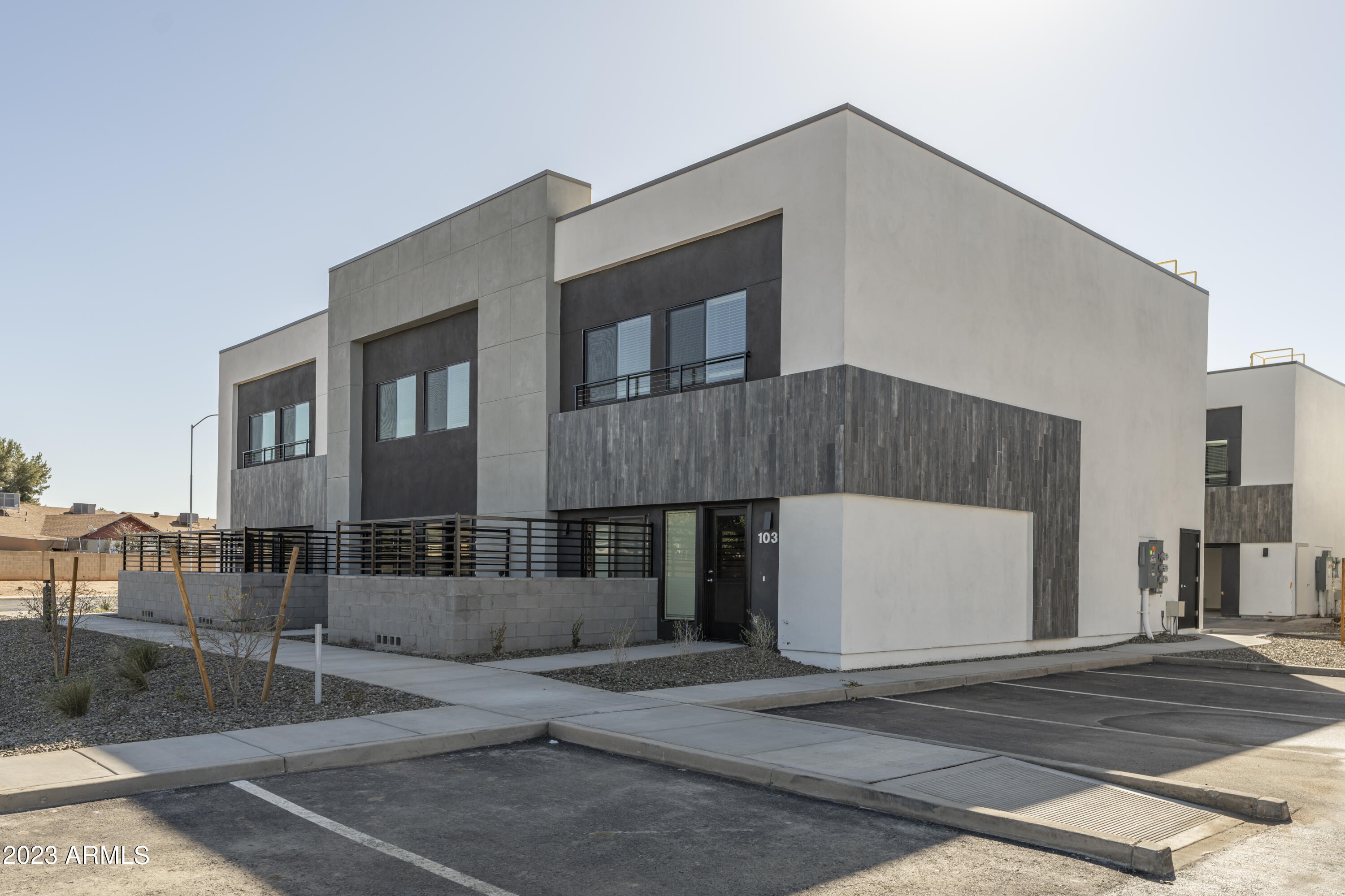 432 South 32nd Street, Unit 114 Mesa, AZ 85204 - Photo 69 of 75 a front view of a house with garage