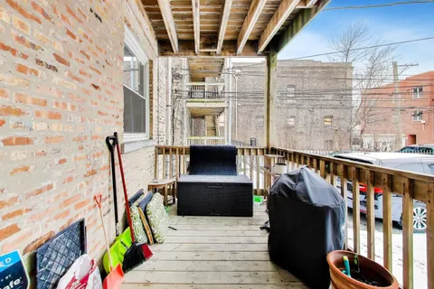 a view of building with an outdoor seating