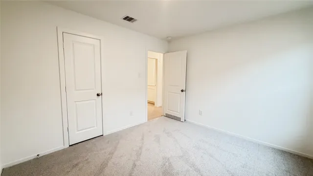 an empty room with an entryway