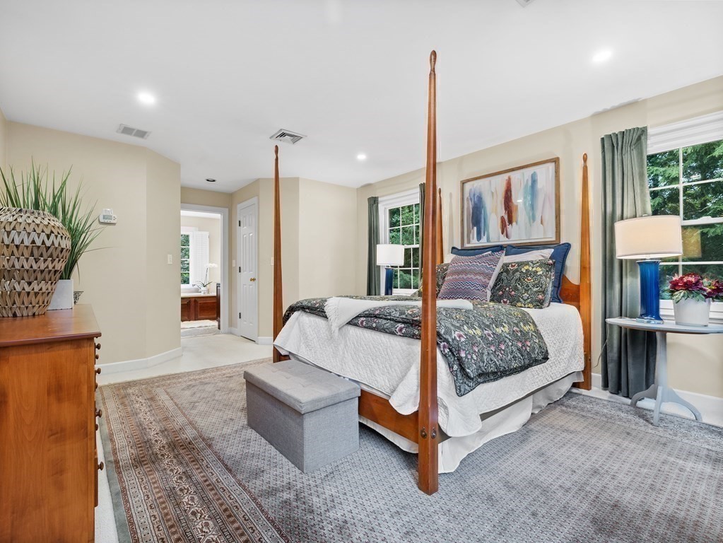 34 Upwey Road Wellesley, MA 02481 - Photo 13 of 19 a bed room with a bed and a couch