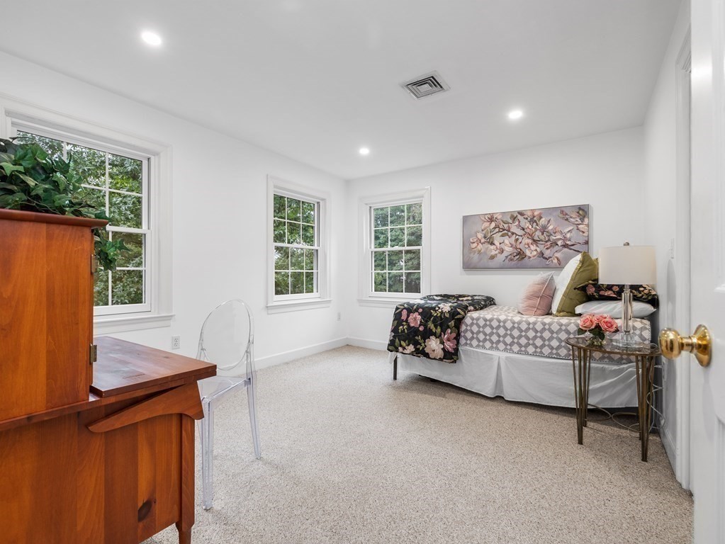 34 Upwey Road Wellesley, MA 02481 - Photo 14 of 19 a bedroom with furniture and a window