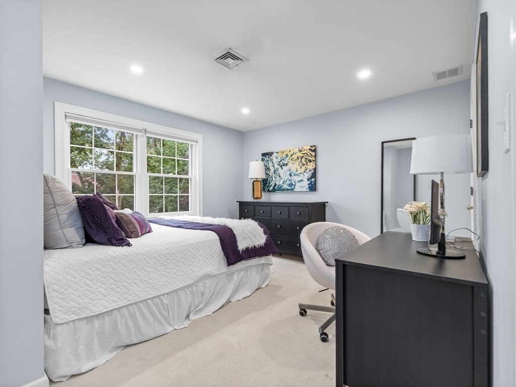 34 Upwey Road Wellesley, MA 02481 - Photo 15 of 19 a bedroom with a bed and a window